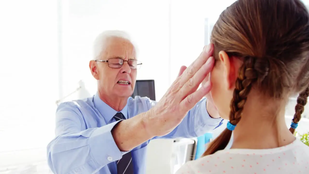 Male doctor interacting with patient