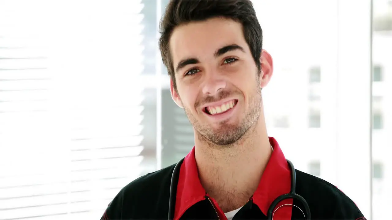 Portrait of male paramedic smiling