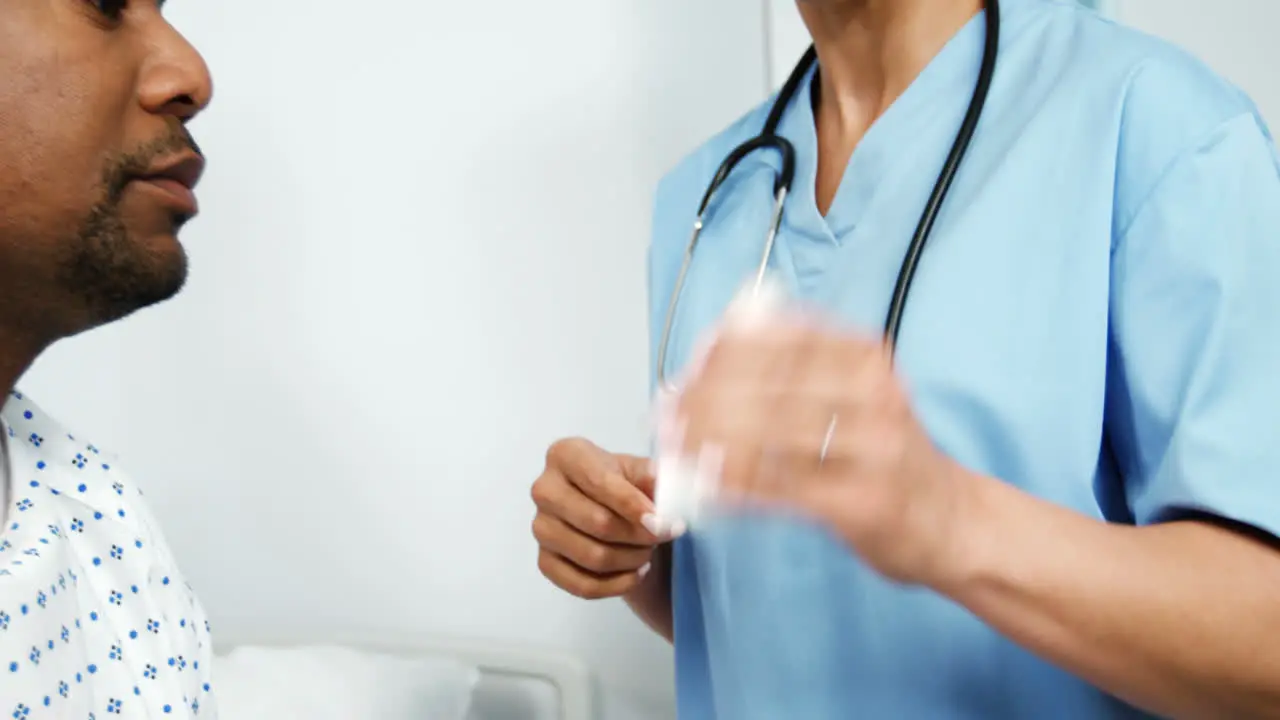 Female doctor showing an asthmatic patient how to use an asthma inhaler