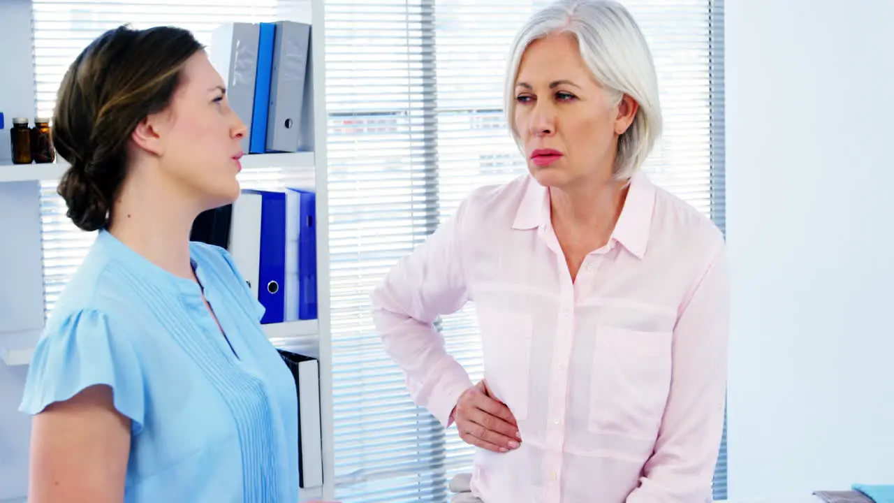 Female doctor interacting with patient