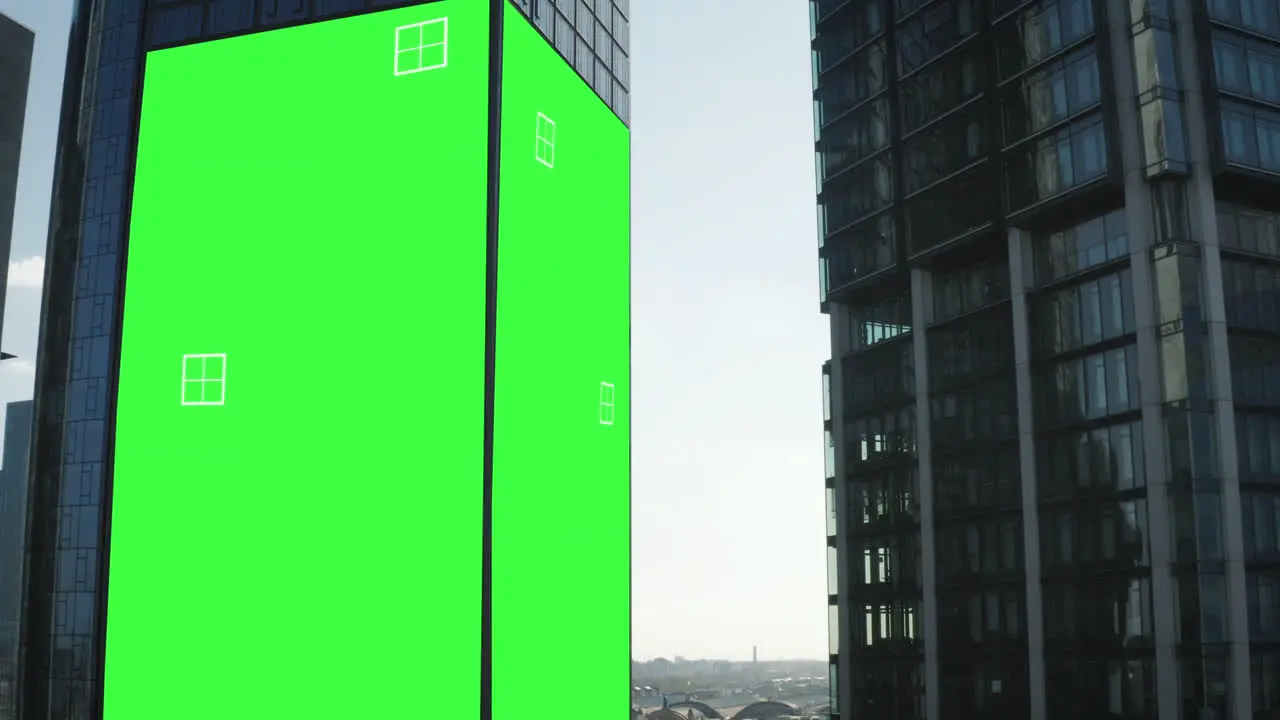 Rising footage of modern downtown skyscrapers with glossy grass facades Chroma key area for adding your content Frankfurt am Main Germany