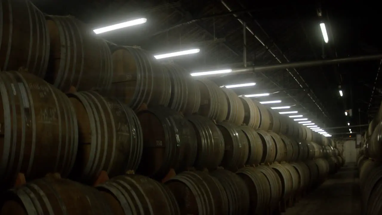 Stacked Whisky Casks in Warehouse