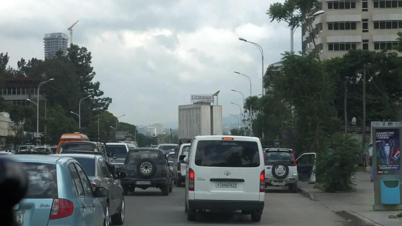 The street is crowded and all cars heading to Ethiopian Airline building