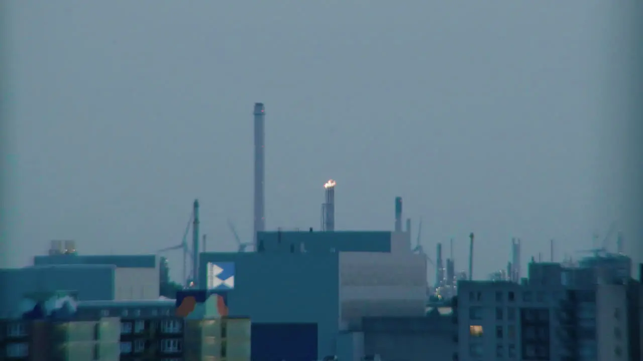 Shot of gas flaming from a tube in the harbour area