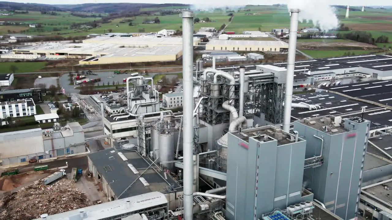 Aerial View of Manufacturing Plant with Polluting Smoke from Wood Processing Factory in Germany