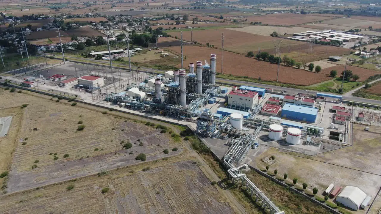 Aerial shot of a power generation plant and steam