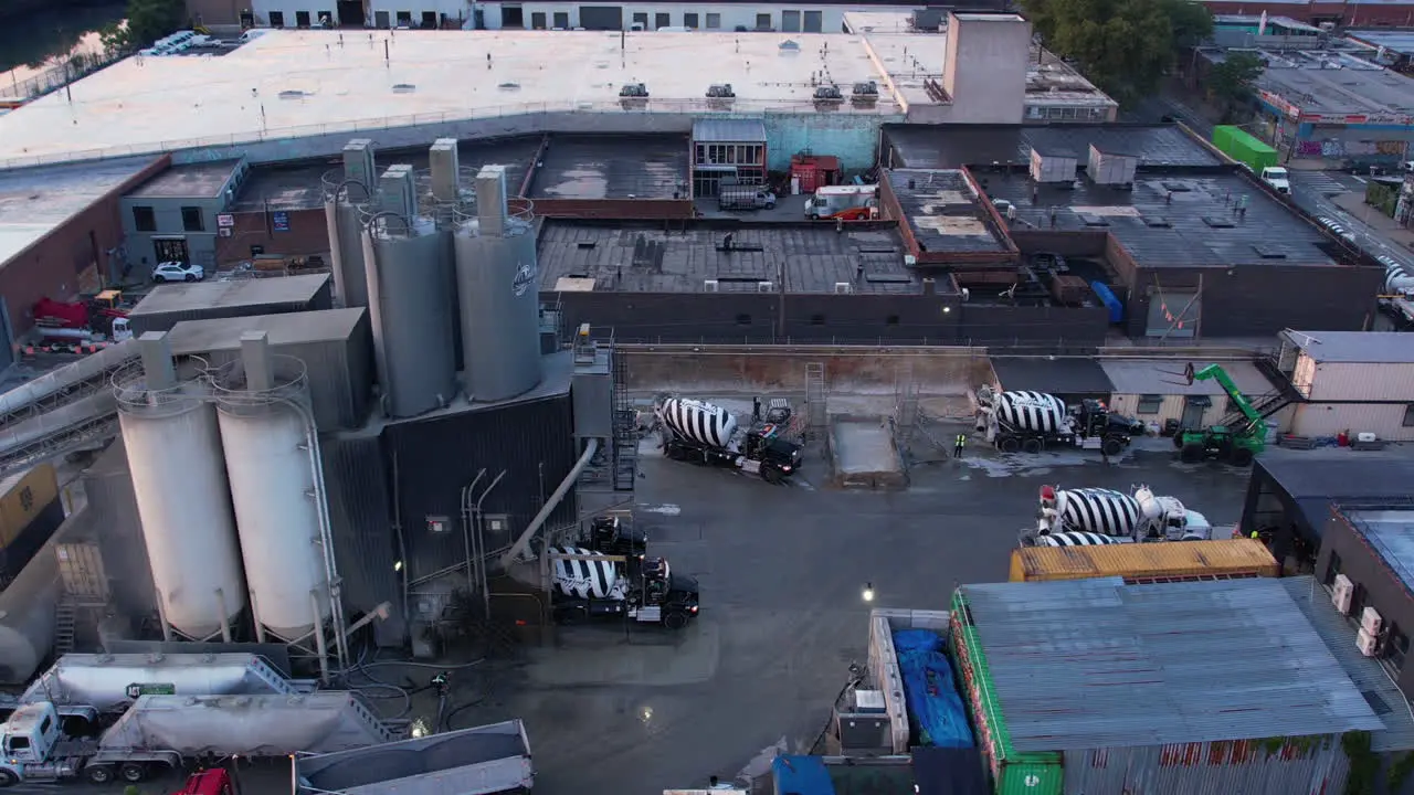 Aerial View of Concrete Ready Mix Plant and Heavy Mixer Trucks