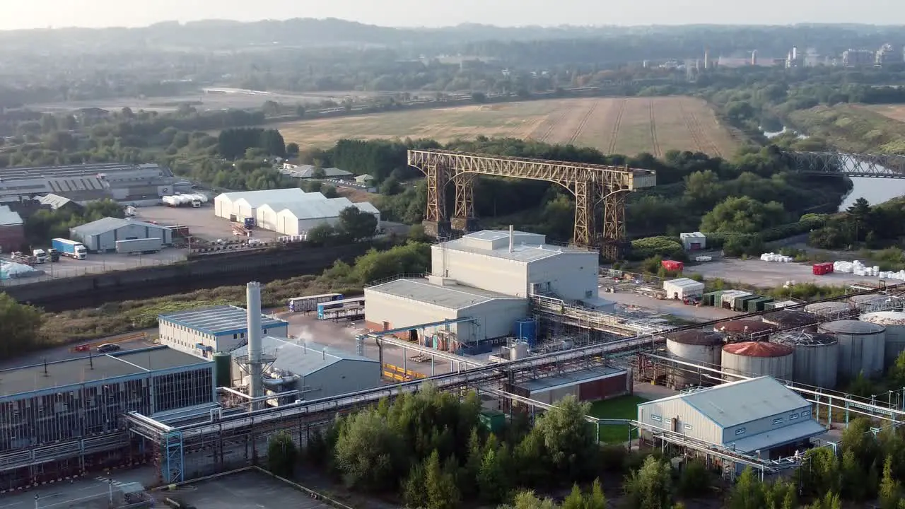 Warrington historic transporter bridge industrial British ship canal aerial view landscape pull away