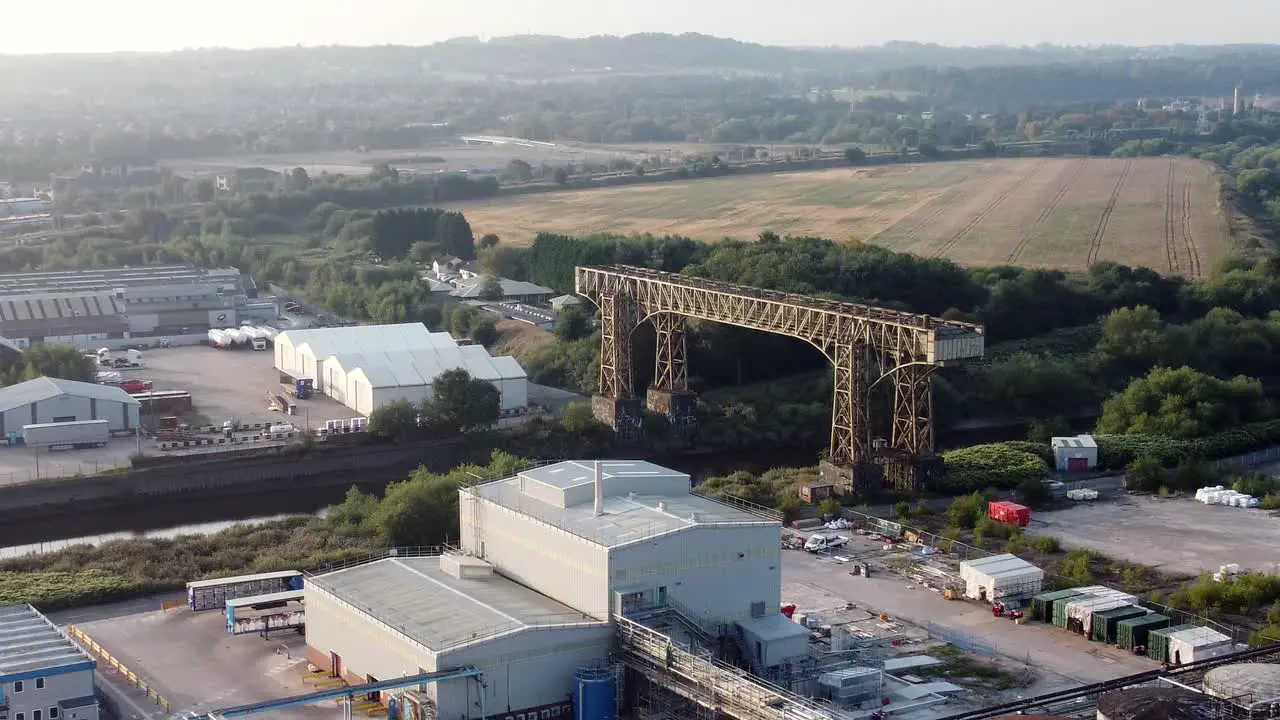 Warrington historic transporter bridge industrial British ship canal aerial view landscape orbit left