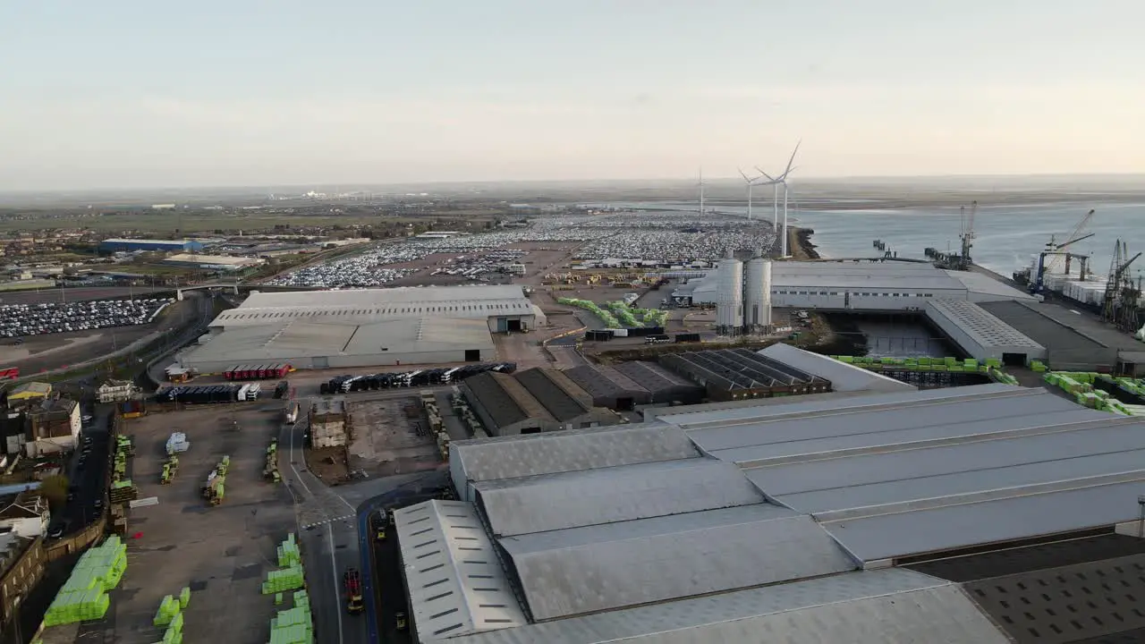 Industrial Buildings And Wind Turbines At The Port