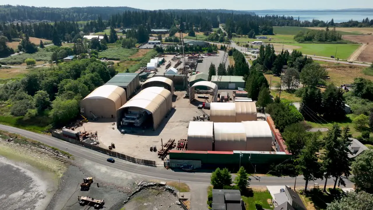 Orbiting aerial shot of a boat building site