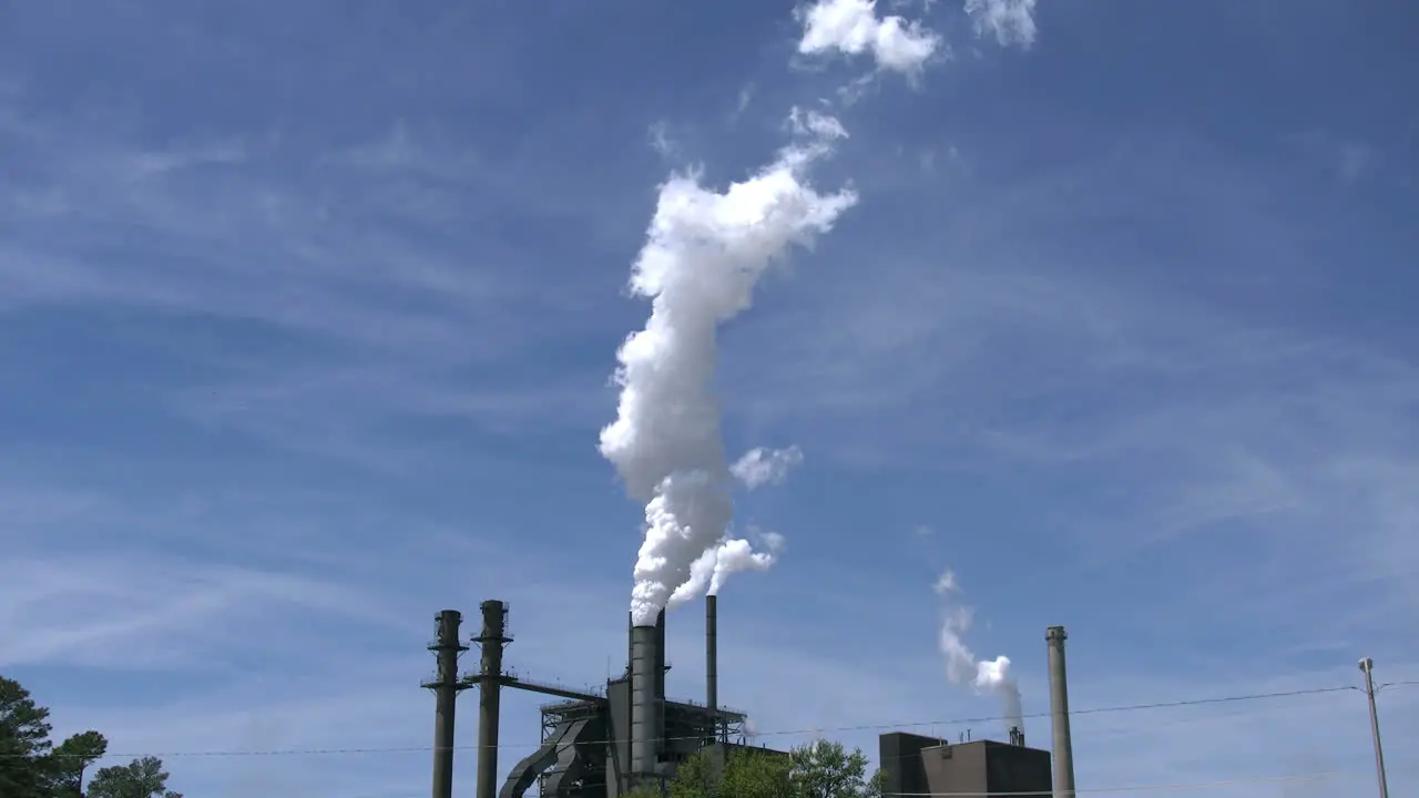 Smokestacks With White Steam