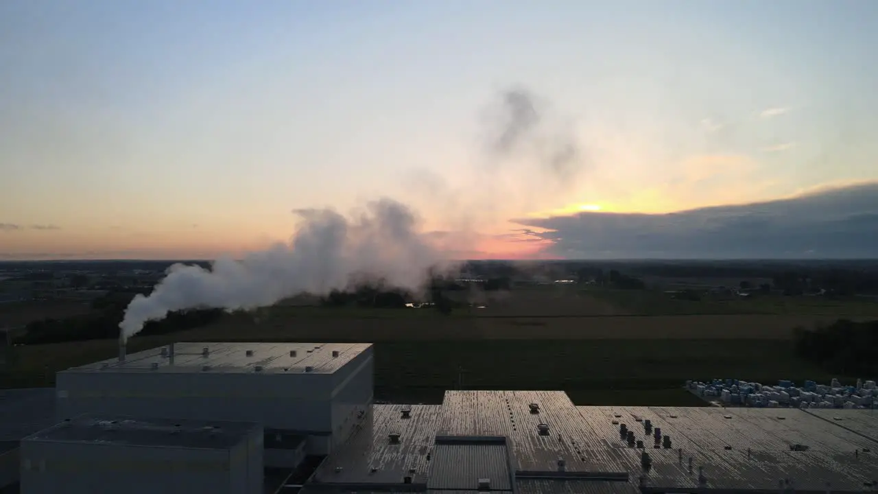 Left pan of factory with beautiful sunset in the background