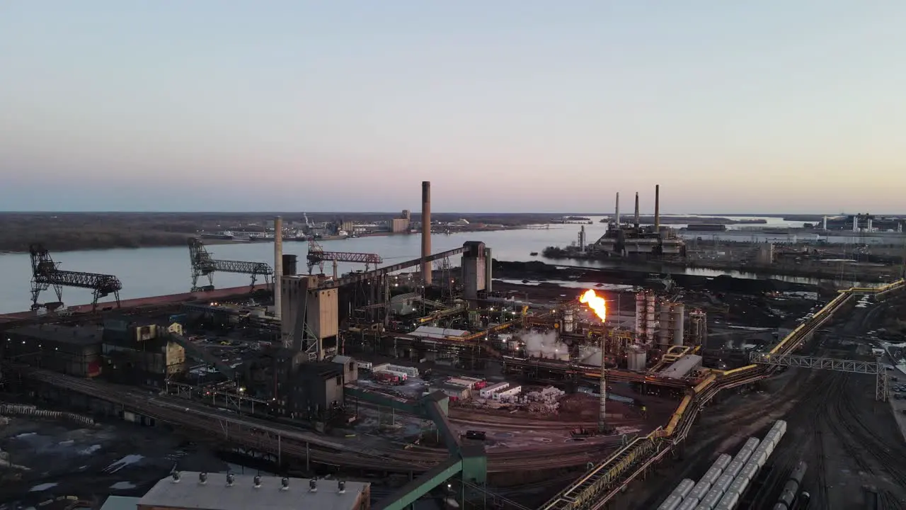 Steel mill at Zug island producing iron dolly forward aerial shot Detroit Michigan