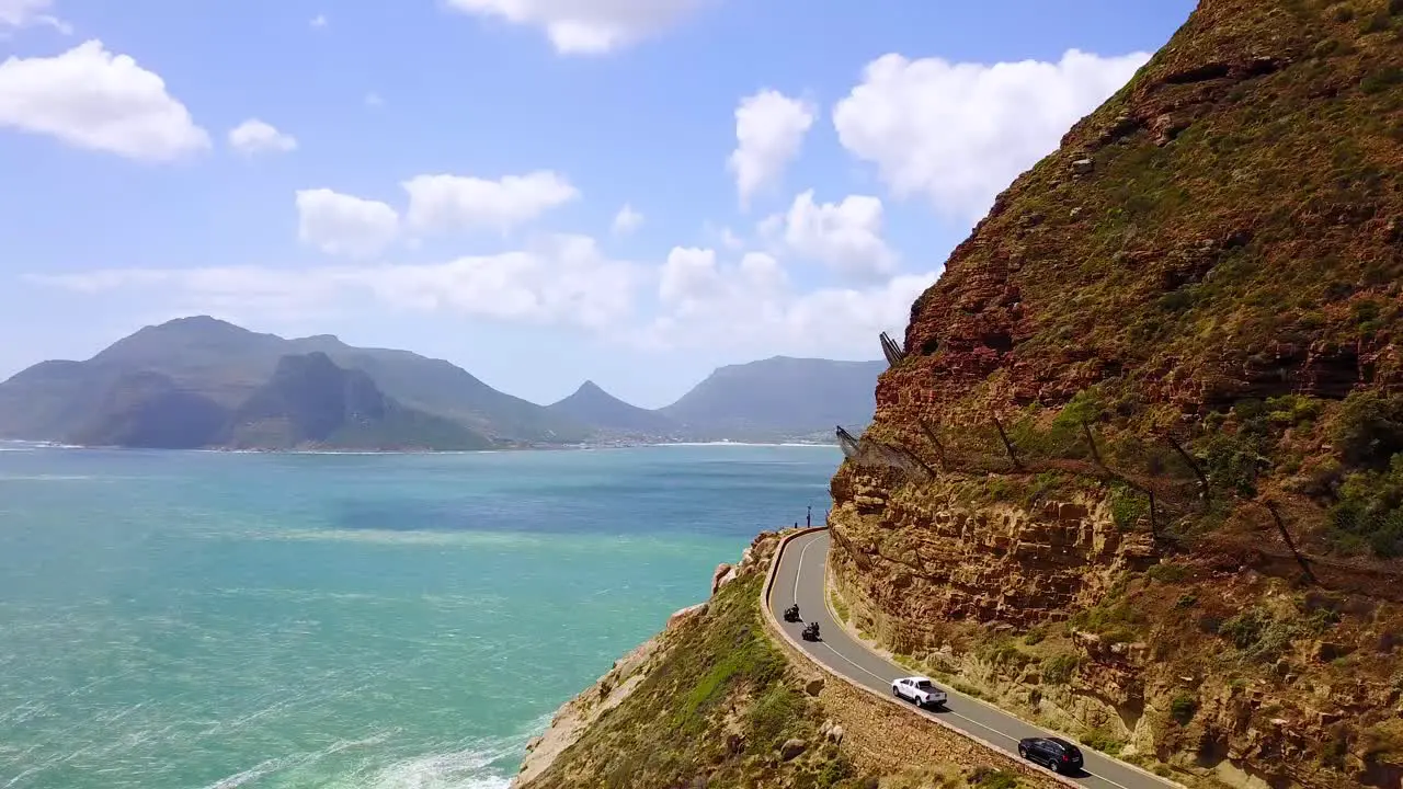 Aerial of the beautiful coastline and narrow roads south of Cape Town South Africa 2