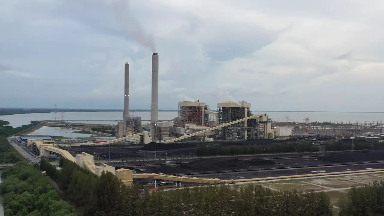 Pedestal up shot capturing ultra-supercritical coal-fired power plant by Tenaga Nasional Berhad TNB located at artificial island manjung perak malaysia used as fuel to generate electric power