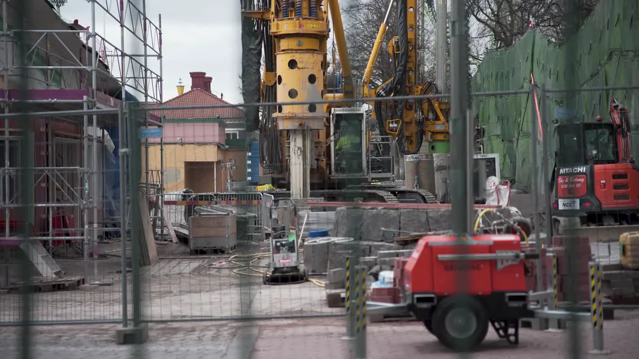 Big construction machine working inside of Liseberg amusement park in Gothenburg Sweden