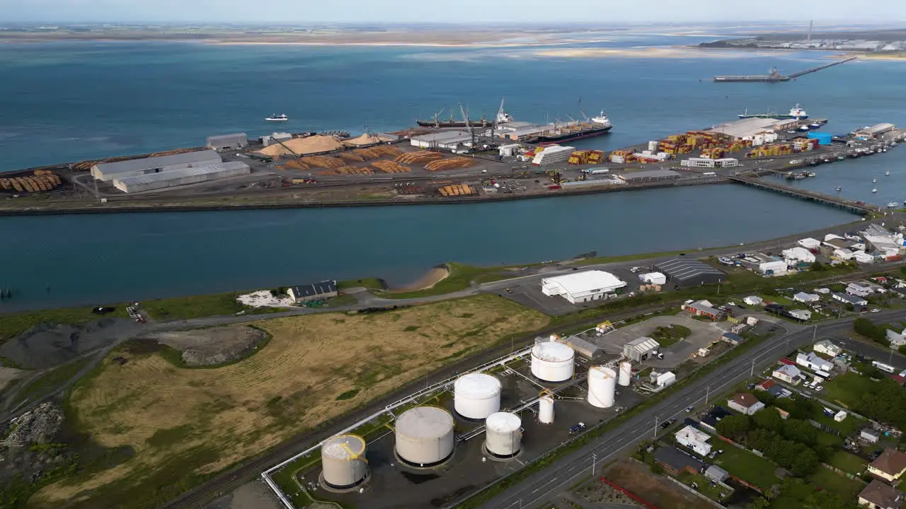 Cargo port in Bluff New Zealand with loading dock for timber export aerial view