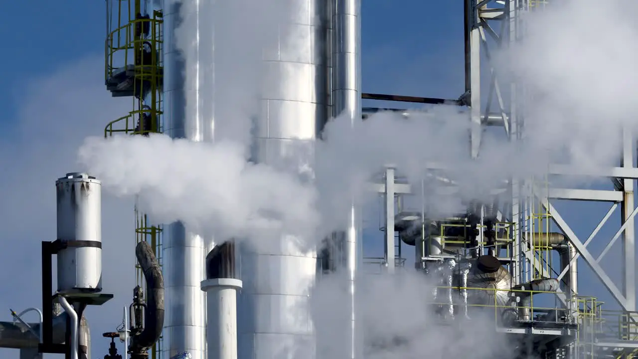 Tanks pipes and smoking chimneys of the chemical plant