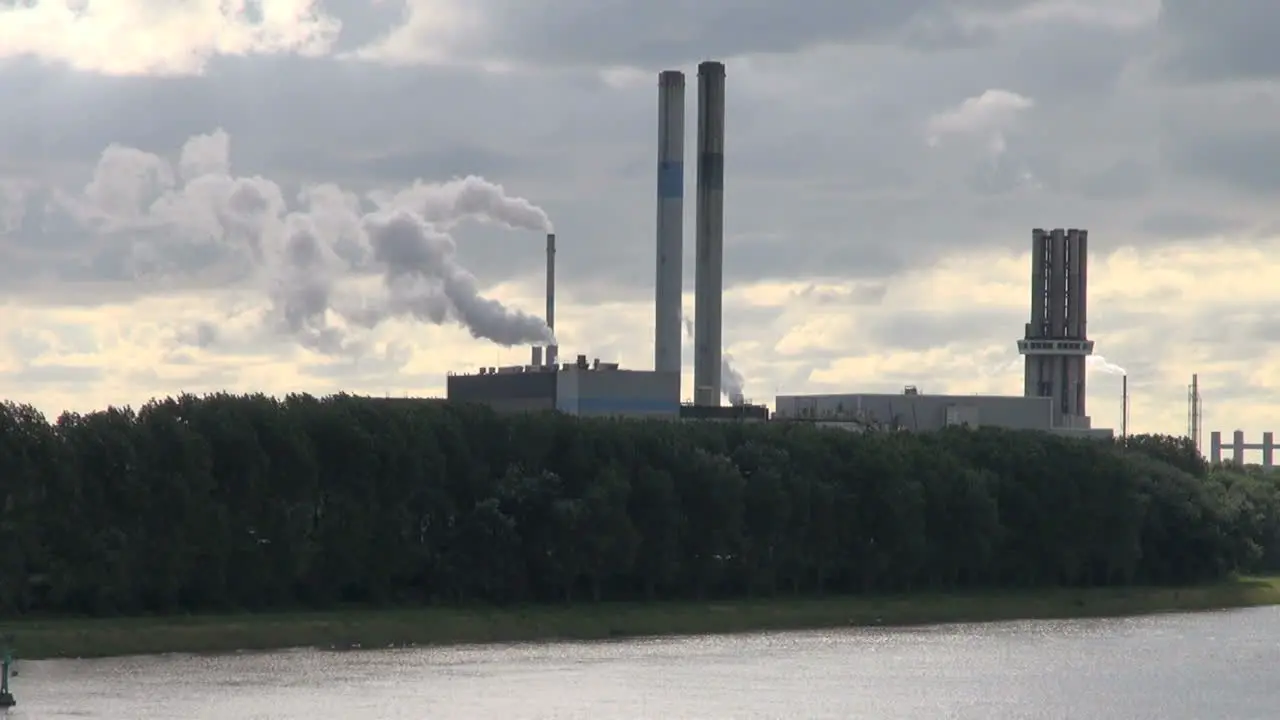 Netherlands Rotterdam refinery two smoke streams and twin stacks 4a