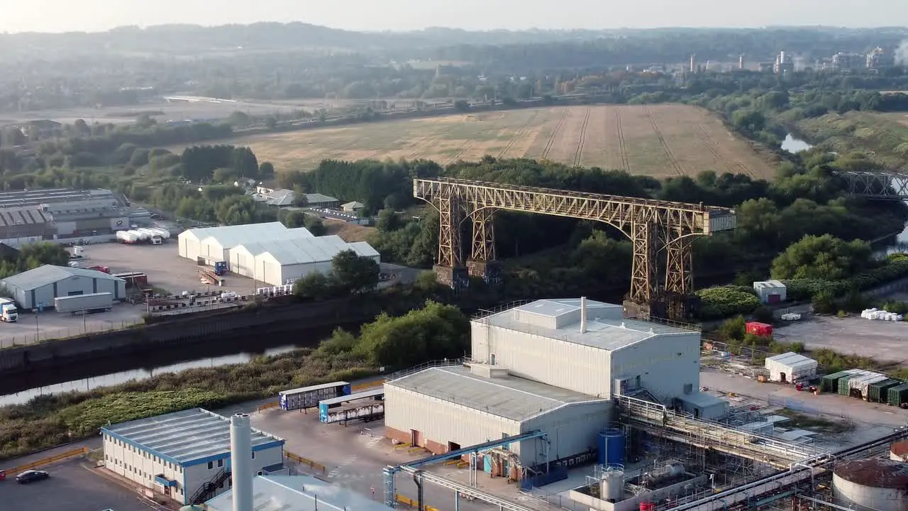 Warrington historic transporter bridge industrial British ship canal aerial view landscape orbit wide left