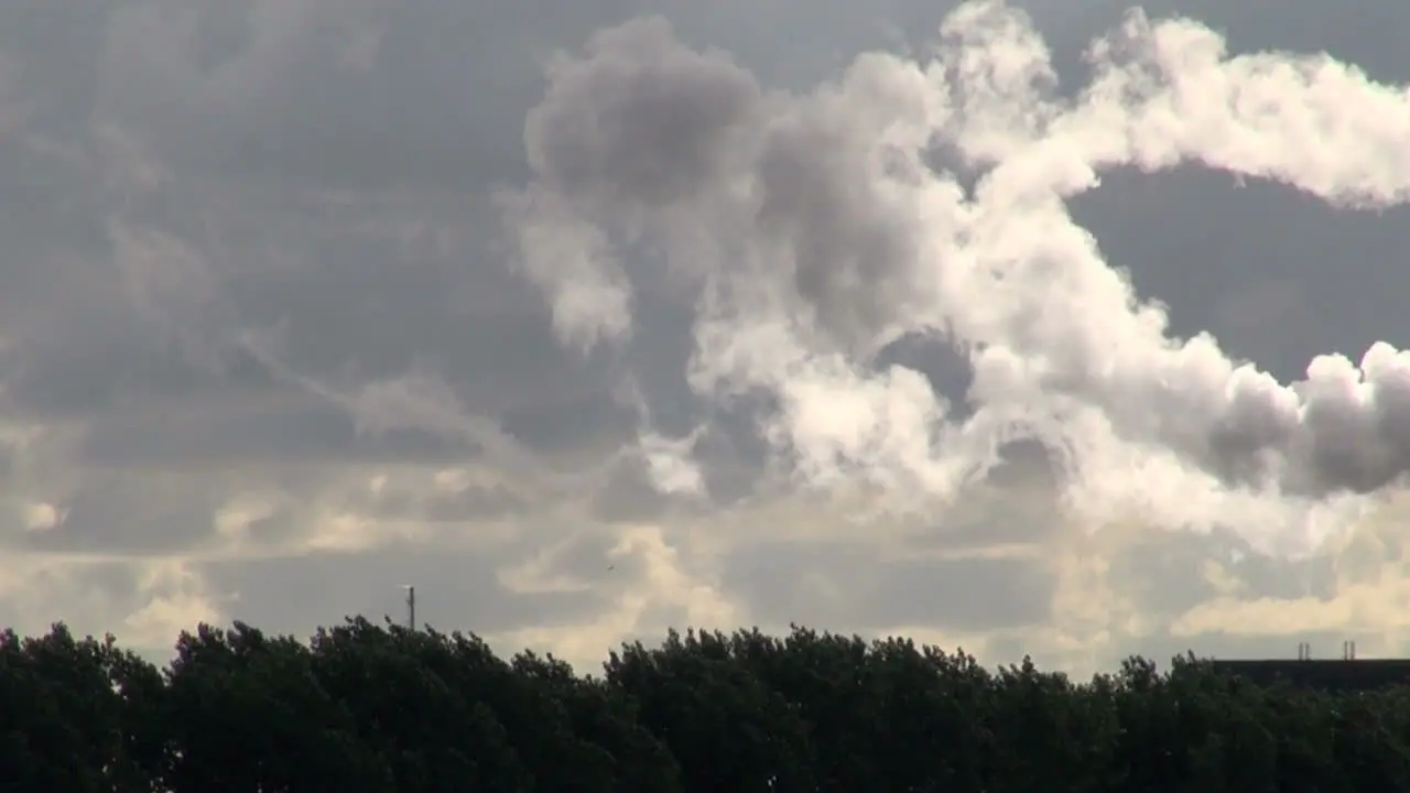 Netherlands Rotterdam clouds circulating turn into smokestack trails