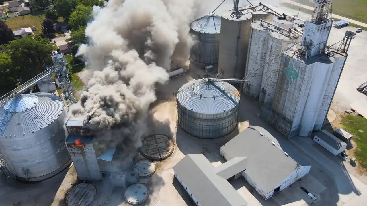 Aerial Over An Industrial Fire In A Grain Silo Storage Facility On A Farm In Iowa