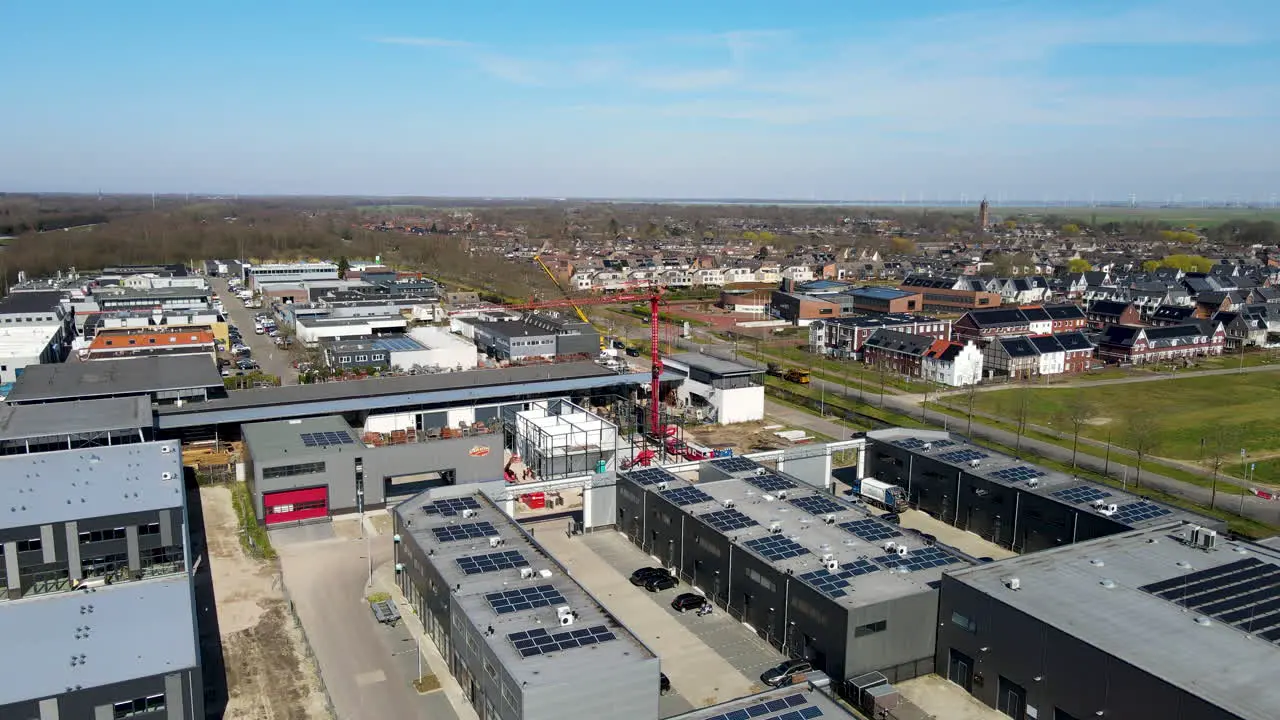 Jib up of newly build industrial zone with solar panels on rooftop