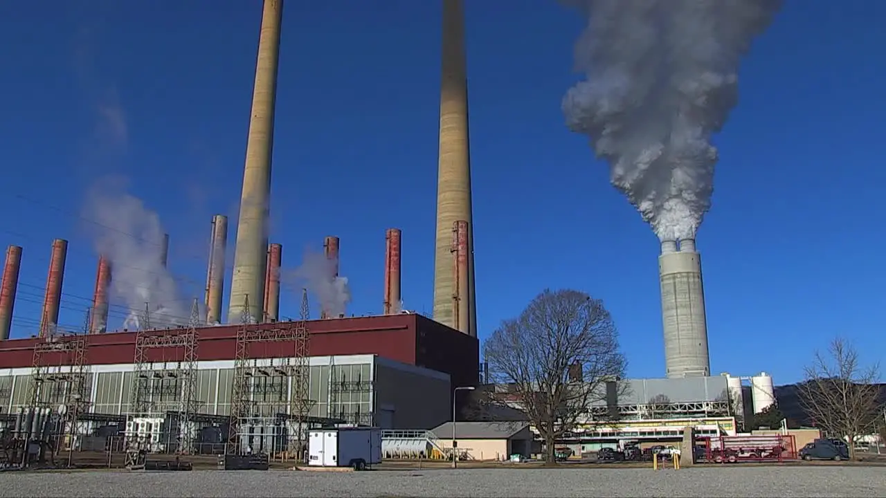 A Coal Fired Power Plant Belches Smoke Into The Air 2