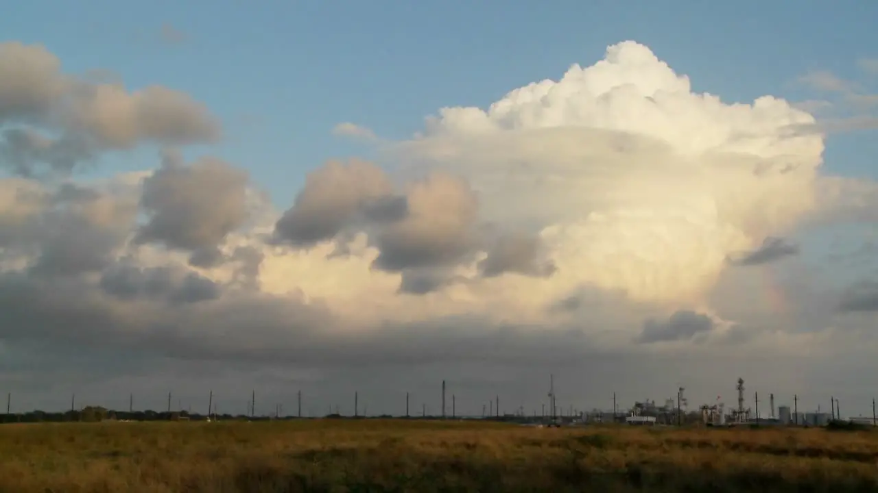 Time Lapse of clouds over an oil refinery