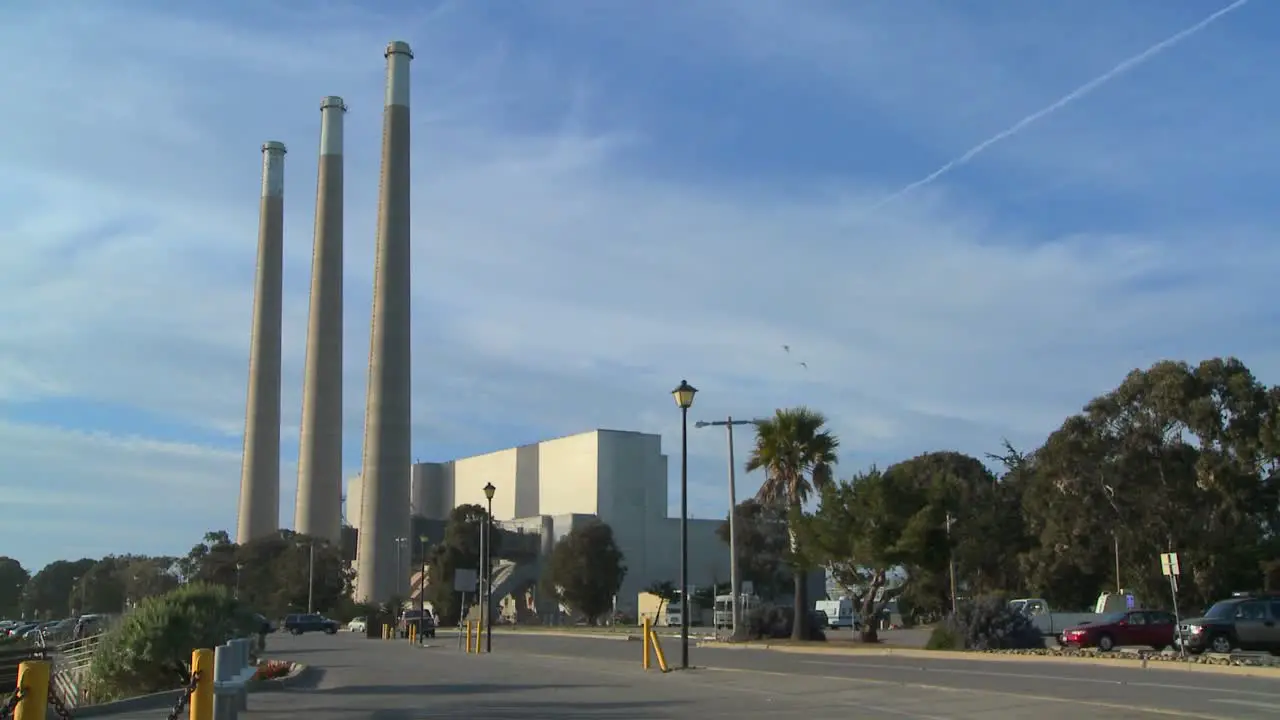 An establishing shot of a power plant