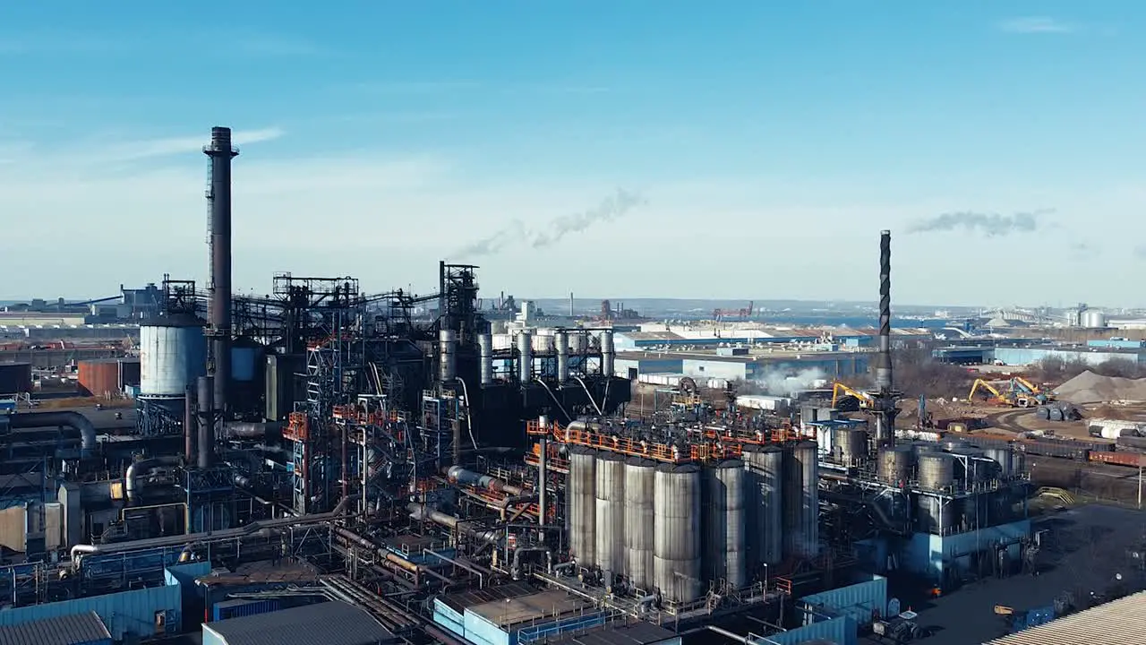 Aerial Shot of Factory Polluting in Industrial Area