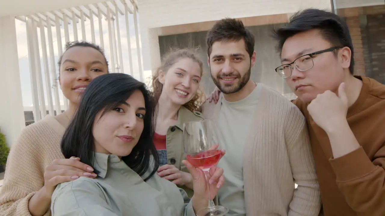 A Nice Group Of Friends Take A Selfie While Fooling Around 4