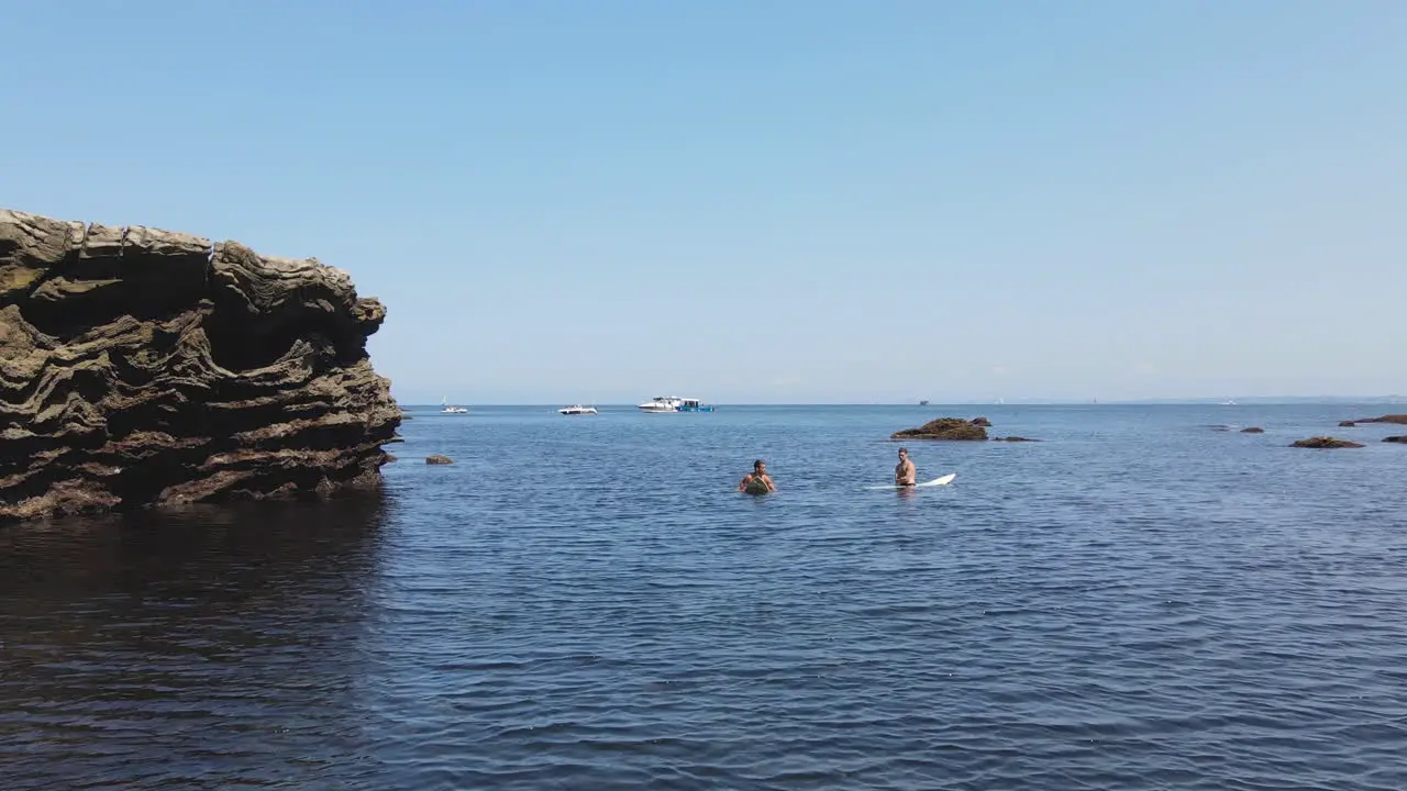 Zoom In Shot Of Blue Sea With Rocky Coast