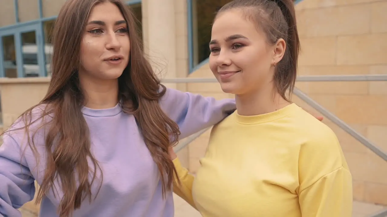 Young Female Friends Taking A Selfie Outside