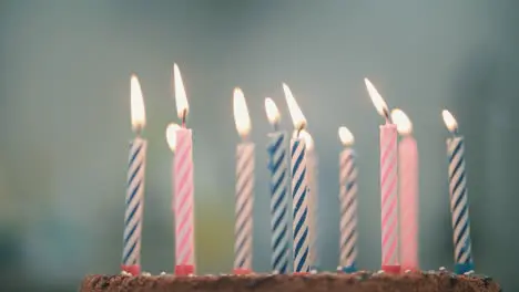 Burning candles in birthday cake Sweet dessert for party Birthday candles