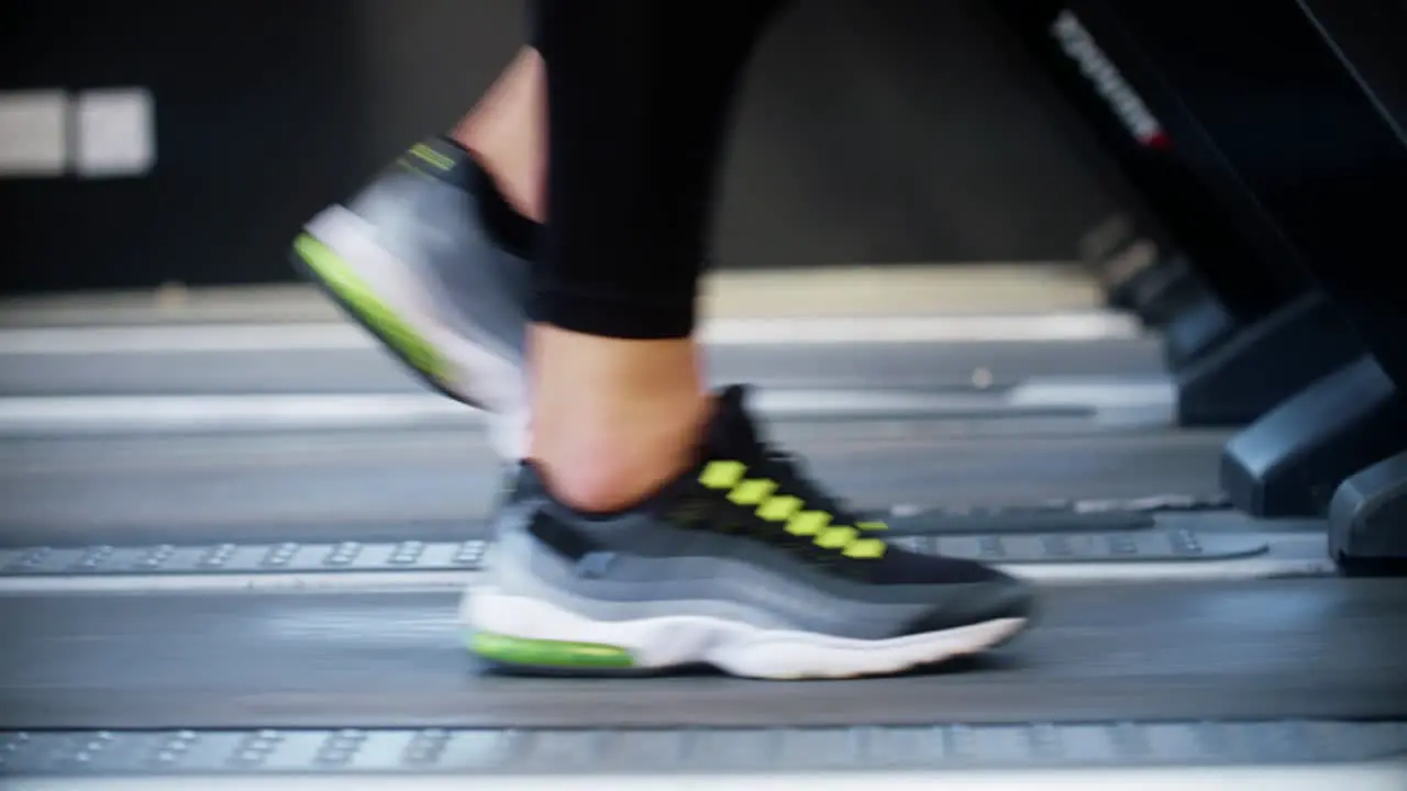 Side on Shot of Person Training on Treadmill