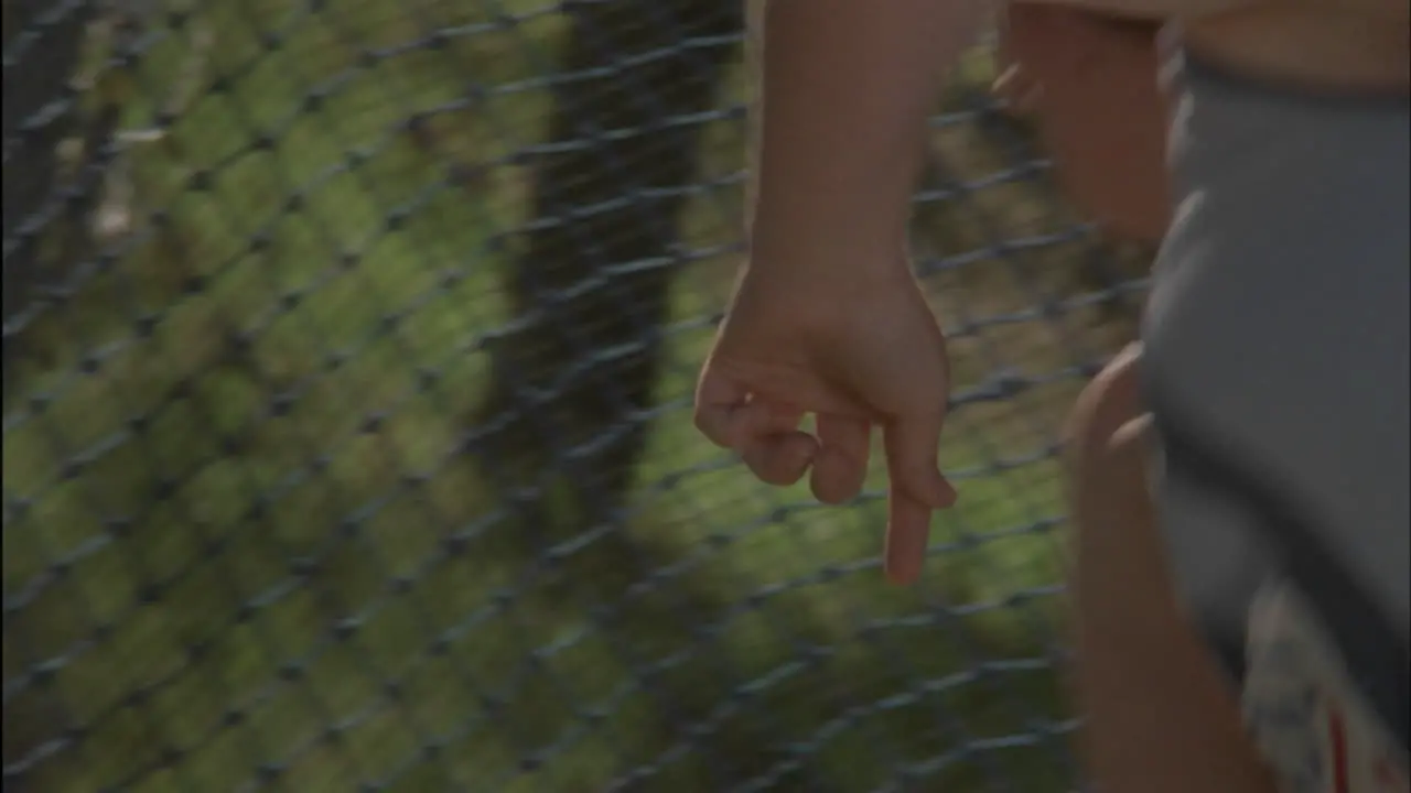 A woman throws a shot put