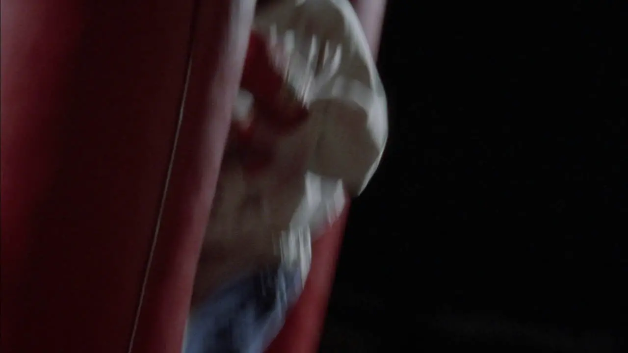 A boxer works out on a punching bag 1