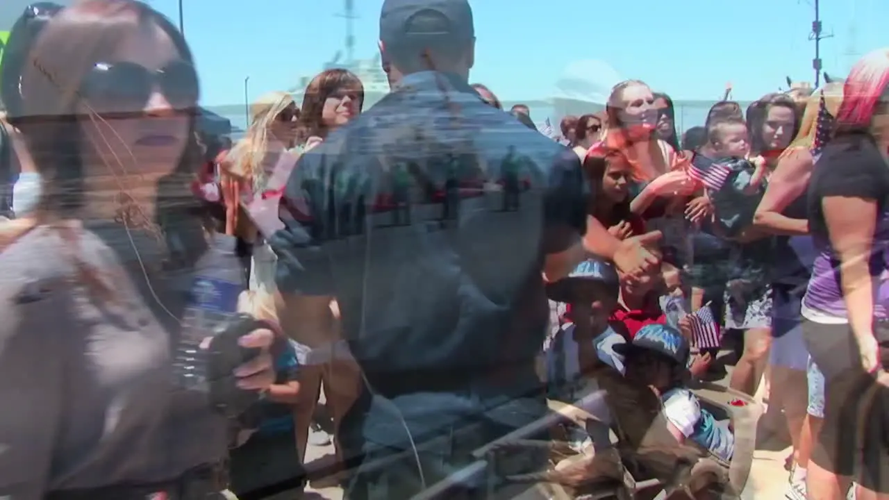 Navy Families Welcome Home Servicemen From An Aircraft Carrier 5