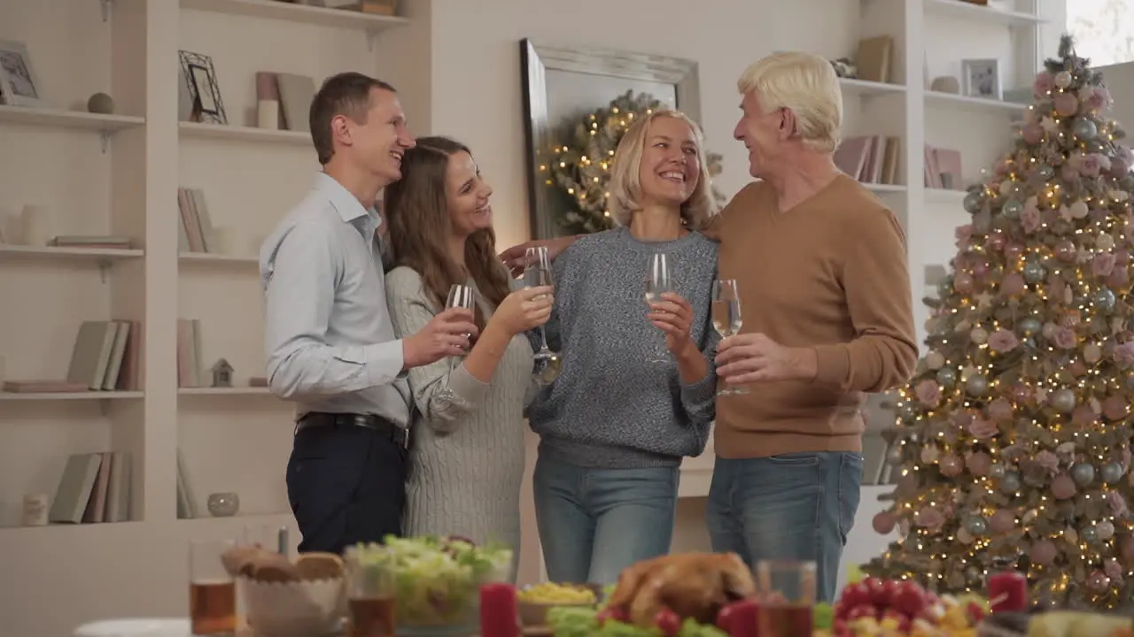 Happy Family Toasting And Celebrating Christmas At Home 1