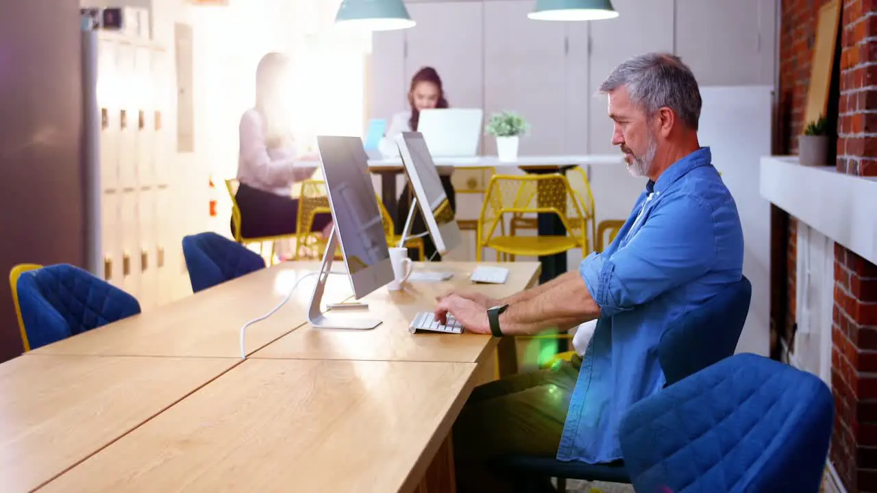 Male executive working on computer