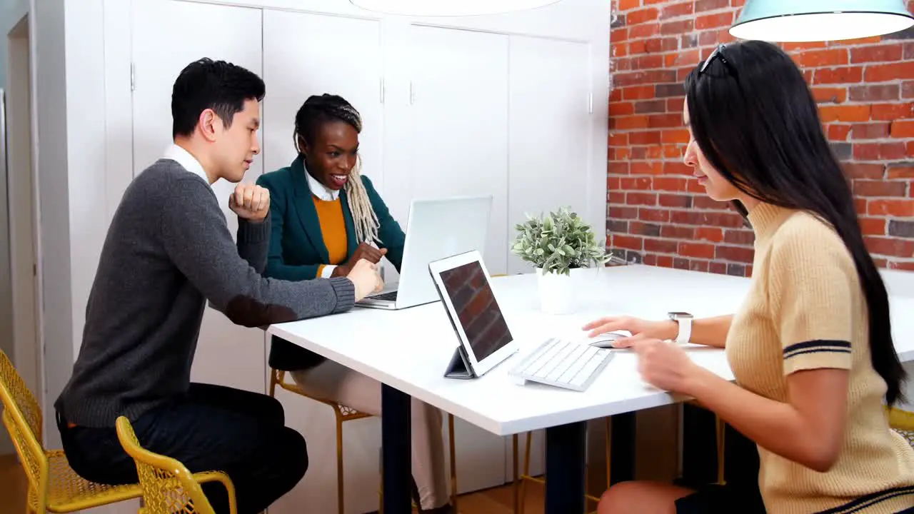 Business executives working at desk