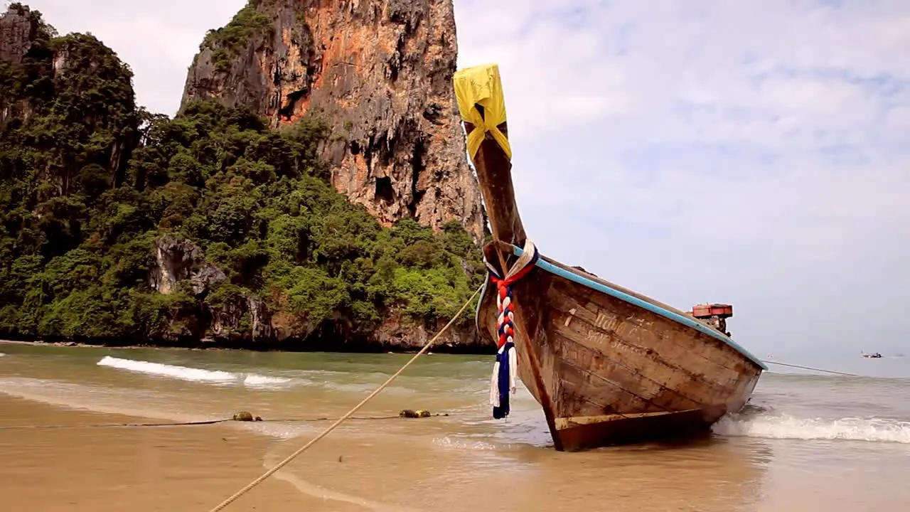 Longtail Boat Swaying in the Sea