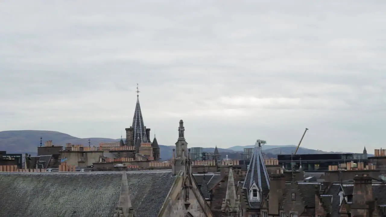 Cranes moving in Edinburgh Rooftops