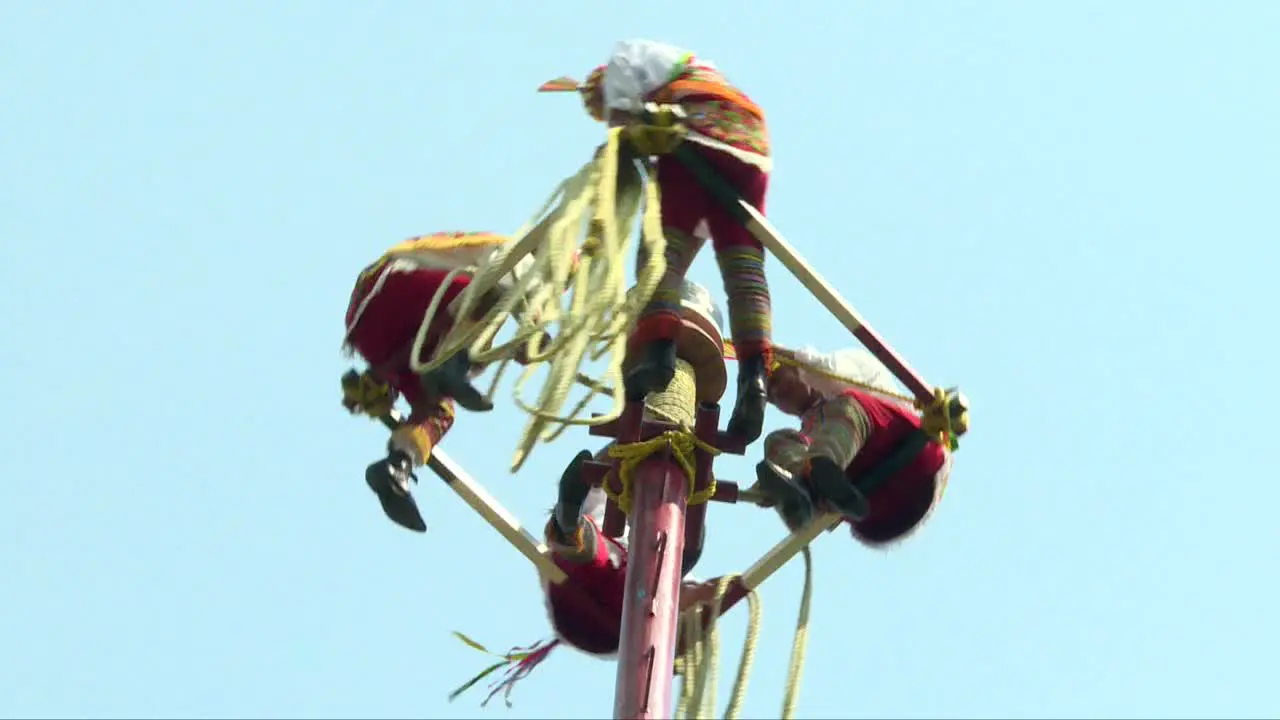 Papantla flyers tying up the rope before executing the traditional mexican ritual