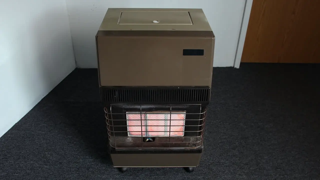 Ceramic butane gas heater in room