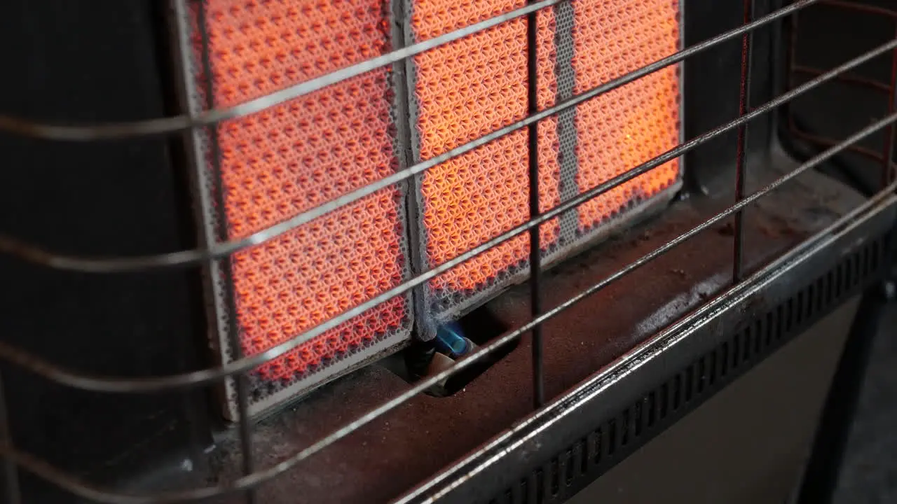 Ceramic butane gas heater glowing close up