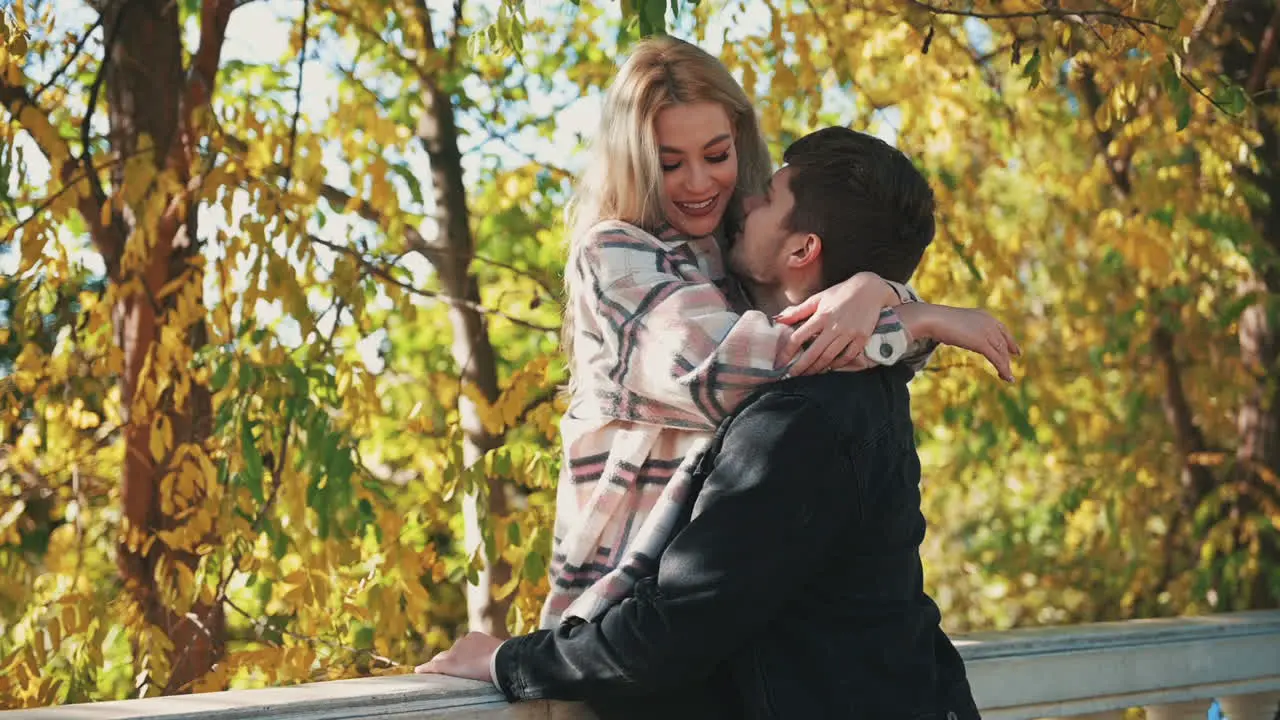 Romantic Man Lifting Woman With Long Blond Hair