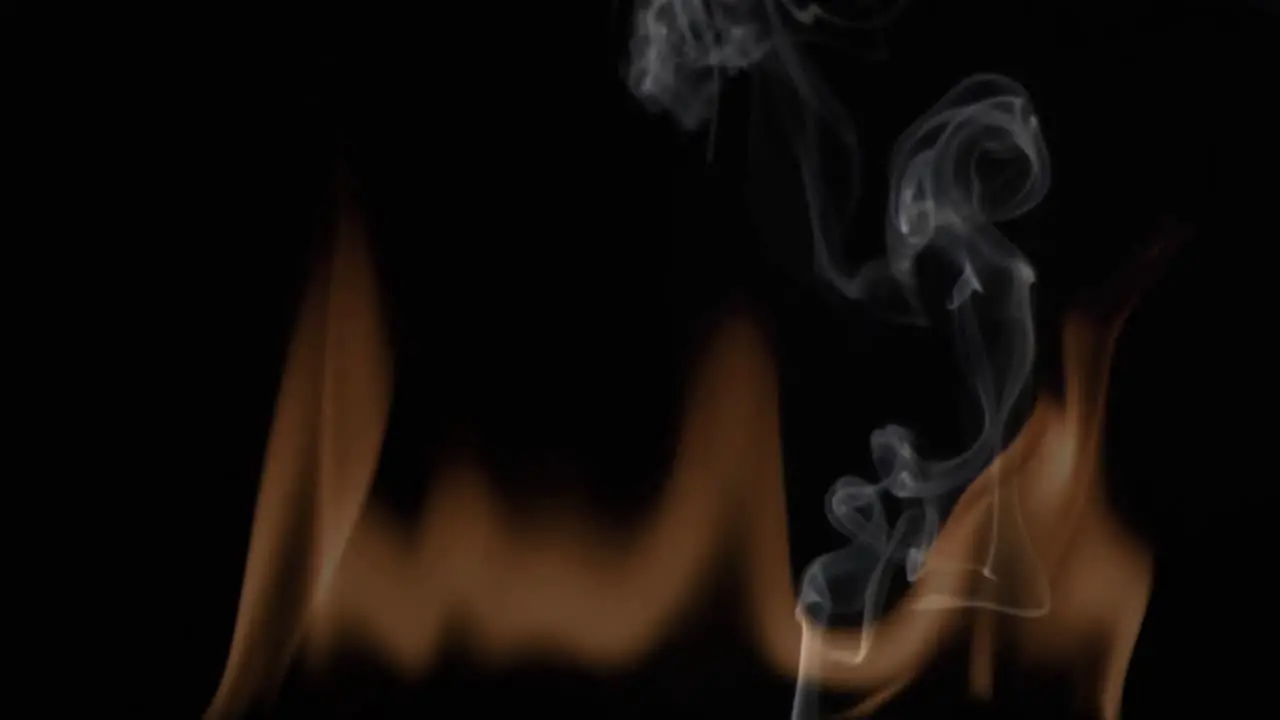 Digital animation of a fake fire with smoke on black background